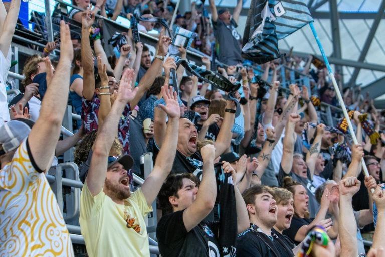 Fans celebrates in the Wonderwall after a goal.