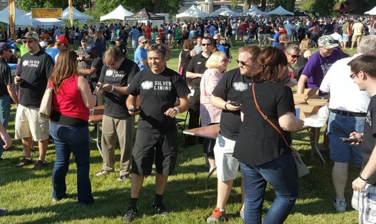 Volunteers Check People In At The Twin Cities Burger Battle 2016