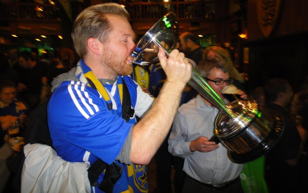 Brad drinks out of the 2011 NASL Championship Trophy
