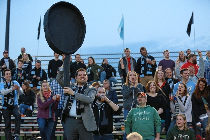 Team President Nick Rogers with the ceremonial Iron Skillet