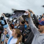 Dark Clouds twirling scarves for a corner kick