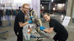 Jake and Amanda fixing a bike at FB4K 2016