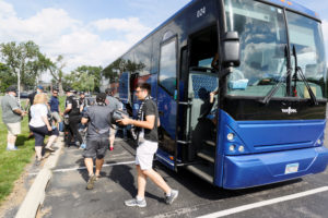 Supporters exit the bus during our 2016 trip to Indy. (Photo: Jeremy Olson)