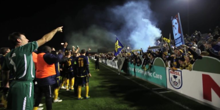 The Stars serenade the Dark Clouds after winning the first leg of the 2011 NASL Championship final. (From a video courtesy NSC Minnesota Stars)