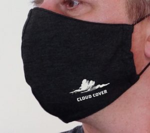 Man wearing mask with DCMN logo and 'Cloud Cover' written under