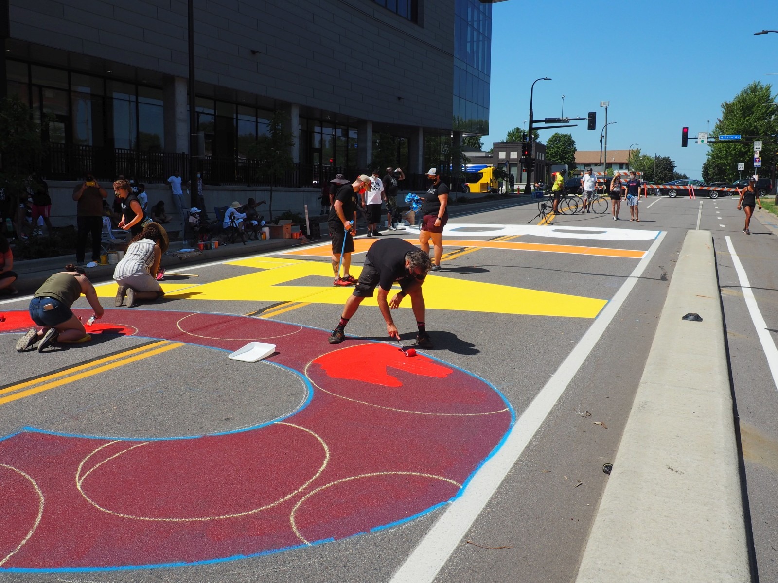 DCSL volunteers help paint the Black Lives Matter mural