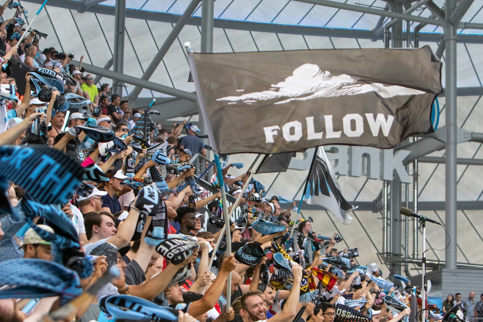 the Dark Clouds FOLLOW flag filies over the Wonderwall during a match